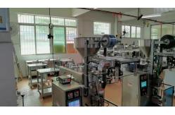 China 3 Side Liquid Packer Machine 60bags/min Auto Weighing Filling Machine supplier