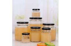 China 730ml Polygon Hexagon Glass Storage Bottles Embossed For Chili Sauce Pickle supplier