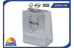 China Glossy / Matt Custom Printed Paper Bags With Handle Rope For Garment supplier