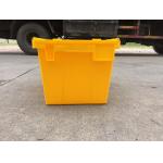 Yellow Plastic Storage Bins Attached Lids Stacked For Transportation