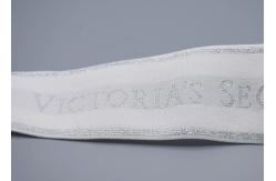 China Clothing Customized 35mm White Jacquard Elastic Tape With Shiny Silver Logo supplier