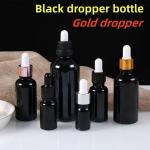 5ml 10ml 15ml 20ml Essential Oil Serum Flat Shoulder Round Shiny essential oil bottle Black Glass Dropper Bottle for sale