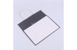 China CMYK Printing Wide Base Paper Carrier Bags supplier