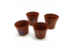 China Hydroponics PP Bonsai 85mm Orange Plastic Flower Pots With Label supplier