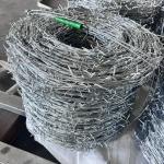 Factory Hot Dipped Galvanized Barbed Wire For Mesh Security Fencing 12.5 Gauge 18 Gauge PVC Coated Iron Barbed Wire for sale