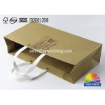 Kraft Custom Paper Shopping Bags , Plastic Handle Eyelet Brown Craft Tea Gift Bags for sale