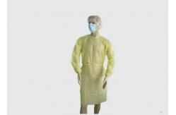 China Lightweight Disposable Barrier Gowns Non Absorbent Yellow Isolation Gowns supplier