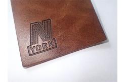 China Custom Leather Label Design Clothing Embossed Leather Patches For Garment supplier