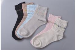 China Elastic Persistent Pink Cotton Baby Socks With Long White Gloss Fiber supplier