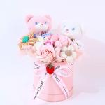 A doll, potted plant, soap, bouquet, finished figurine for a girl's birthday gift to give to her best friend for sale