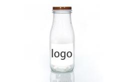 China Bpa Free 25Oz 32Oz Pasterurization Juice Milk Delivery Glass Bottle With Metal Lid supplier