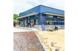 China Q235 Q355 Grade Prefab Warehouse Building Low Maintenance supplier