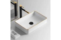 China Waterfall Black Basin Faucet With Golden Handle Hot And Cold Mixer supplier