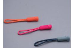 China 3D Embossed Plastic Zipper Puller With Polyester String For Garments supplier