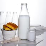 Silk Screen 12Oz 350Ml Clear Beverages Milk Glass Storage Bottle With Cap for sale