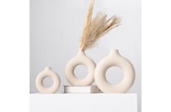 China Sculptural Round Cut Out Vase for Shelf Styling supplier
