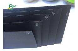China 100% Virgin Pulp Surface Glossy Recyclable Black Paper For Hardcover supplier