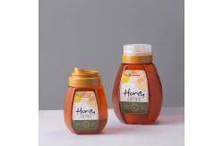 China 300g 500g 1000g Honey Bottles Reflux Inlet Sealing Plastic Seasoning Bottles supplier