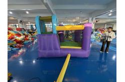 China Polyester Oxford Inflatable Purple Yellow Blue Slide With Toss Play supplier