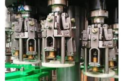China High Speed Glass Bottle Filling Machine With Aluminum Cap Sealing System supplier