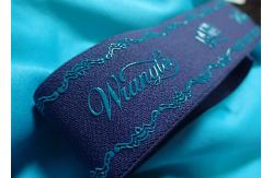 China Custom Logo and Non-slip Silicone Elastic Tape for Garment Coat Jacket supplier