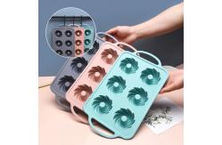 China Heat Resistant 6 Cavity Silicone Baking Mold With Iron Handle supplier