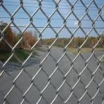China manufacture PVC coated chain link fence for sports ground for sale