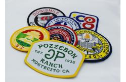 China Lock Edge Round Shape Heat Transfer Badge Custom Made Embroidered Patches supplier