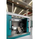 China Dual Head Inclined Bed CNC Horizontal Lathe Machine With 12 Station Servo Turrets manufacturer