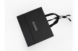 China Full Embossing Black Dyed Garment Paper Shopping Bags With Handles supplier