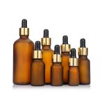 Frosted Amber Color Glass Gold Dropper Bottle Glass Bottle With Black Cap for sale