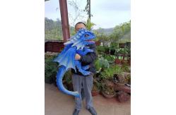 China Hand Puppet Simulation Blue Realistic Animatronic Dinosaur Baby With Wings supplier