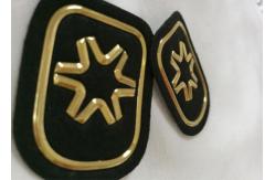 China Black And Gold Embossed 3D Rubber Patches Custom  Badges For Soprtswear supplier