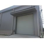 Prefab Steel Structural Workshop Warehouse Wind Resist With Electric Rolling Up Shutter for sale