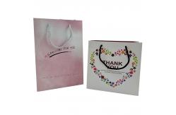 China High Quality Recyclable Customize Design Fancy String Handle Shopping Paper Bag supplier