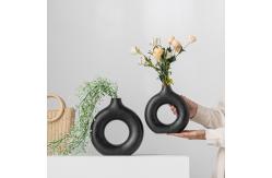 China Sculptural Round Cut Out Vase for Shelf Styling supplier