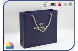 China Personalized Paper Gift Bag With Ribbon Handle CMYK Custom Print Coated Paper Bags supplier