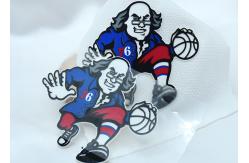 China Custom Silicone Labels Cartoon Garment Patches Old Man Playing Basketball Pattern supplier