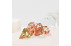 China Orange Flowing Sand​ Resin Gaming Dice Multi Noodle Tablet Game Dice Set supplier