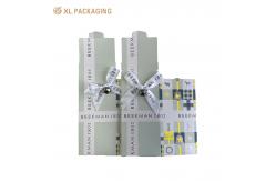 China Cardboard Paper Foldable Card Box Folder Lip Packaging Box With Ribbon Bow supplier