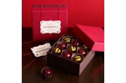 China Custom Design Paper Christmas Chocolate Packaging Lid Base Box with Insert White EVA supplier