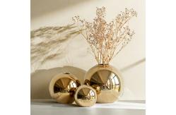 China Statement Sphere Vase in Polished Silver Finish supplier