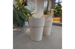 China Cream Composite Clay Flower Pot with Smooth Hand Carved Design supplier
