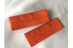 China Comfortable Needleloom Woven Clothing Labels With High Frequency Debossing supplier