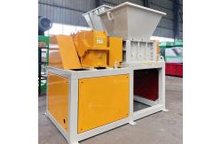 China Easy to Operate Mini Dual Shaft Shredder for Multifunctional Waste Material Shredding supplier