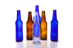 China Carbonated Bulk Glass Beer Bottles 330ml 12 Oz Transparent Clear supplier