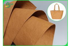China Washable Good Flexibility 0.55mm Kraft Paper Fabric For Recyclable Wallet Making supplier