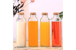 China Empty Round Glass Juice Bottles , Portable Raindrop Flavored Water Bottle supplier