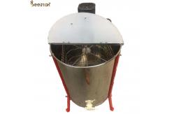 China 4 Frames Stainless Steel Electric Honey Extractor With Stands And Honey Gate supplier