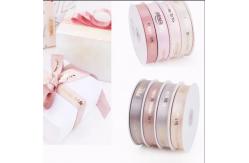 China Custom Logo Printed Satin Gift Wrap Ribbon with Polyester Decoration supplier